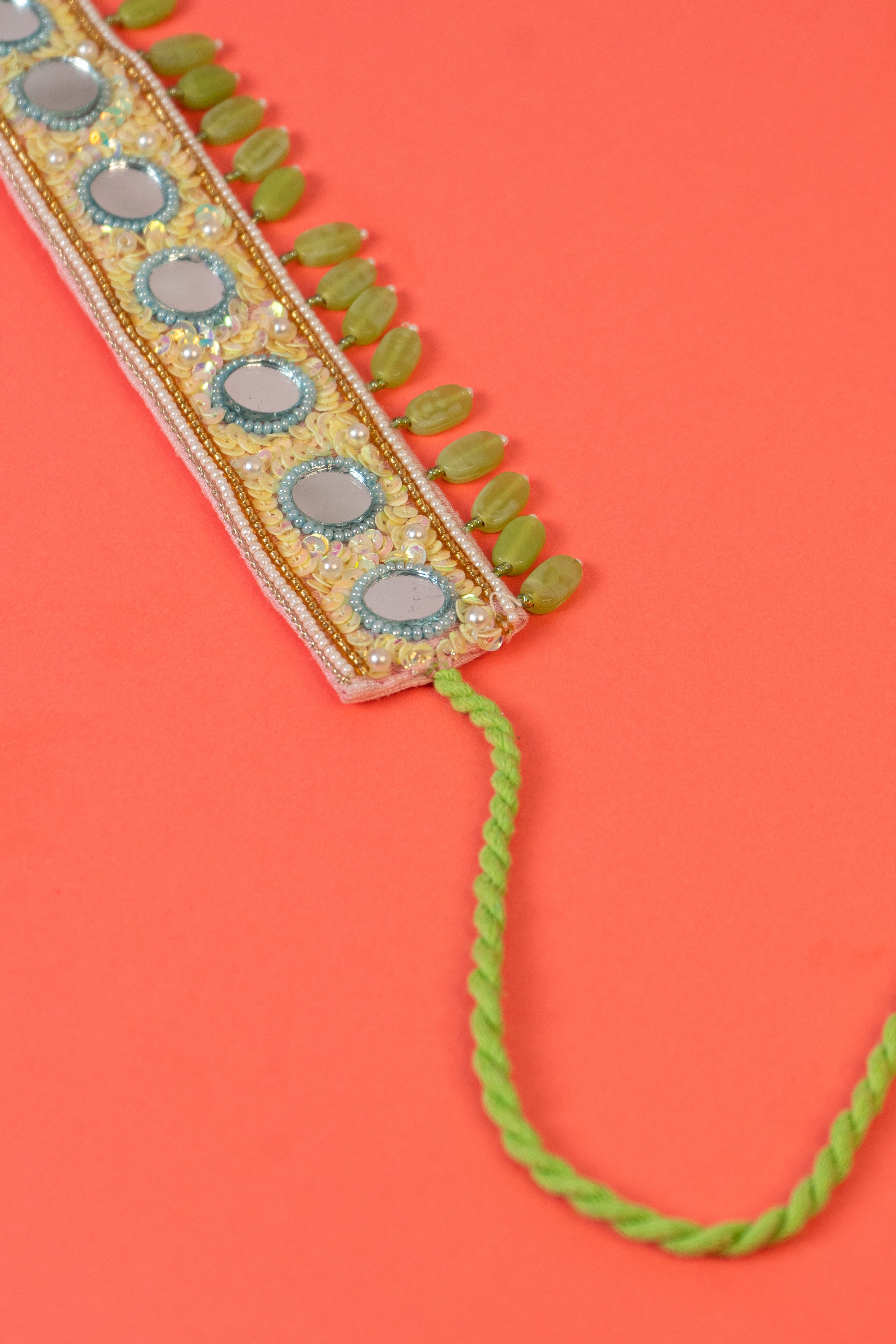 Mirror beaded choker with pearl hanging.